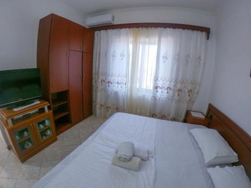 Cama o camas de una habitación en Oceanfront Outlook Rooms
