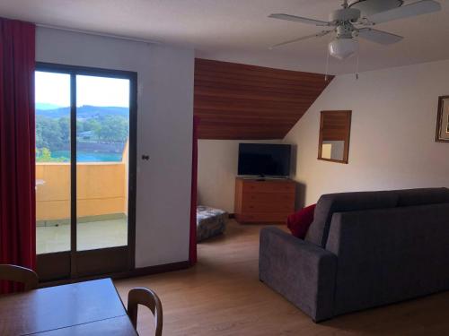 Μια τηλεόραση ή/και κέντρο ψυχαγωγίας στο Apartamentos de la Hoz