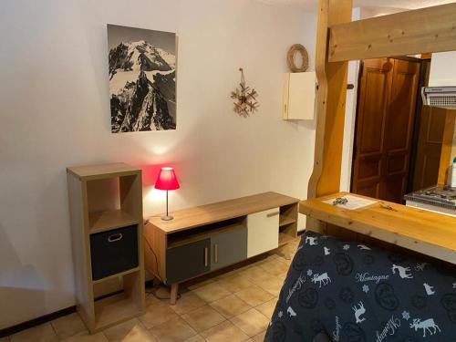Postel nebo postele na pokoji v ubytování 155 Piste dans mon canapé