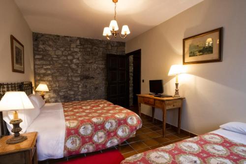 Hotel Los Caspiosにあるベッド