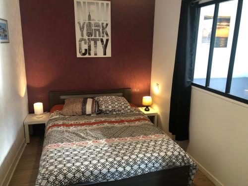 Posteľ alebo postele v izbe v ubytovaní Saint Malo Bel appartement plain pied 300 m gare pres plage du sillon intras muros