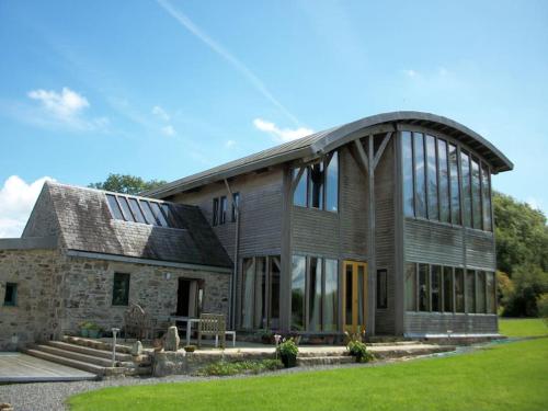 a large stone building with a large group of windows at Mount Coggill in Kilkenny