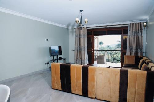Μια τηλεόραση ή/και κέντρο ψυχαγωγίας στο Munyonyo Heights Apartments
