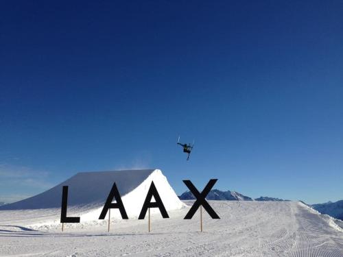 a sign that says laax in the snow at Modern LAAX apt, Swimming Pools, Wellness & Tennis in Laax