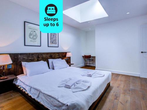 Легло или легла в стая в Beautiful 3-Bedroom House Just Minutes from Queen's Park Tube
