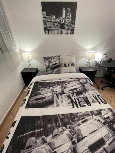 a bedroom with a bed with cars on it at Chambre Privée en colocation dans un appartement Vaulx en Velin Centre in Vaulx-en-Velin