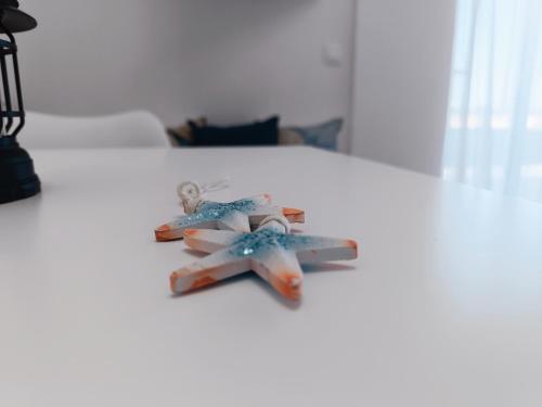 two toy airplanes sitting on top of a bed at Nautilus City Studios & Apartments in Rhodes Town