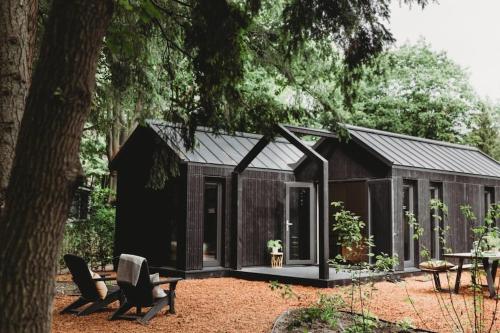 Giardino di Hytte I Tiny house met zonnige bostuin