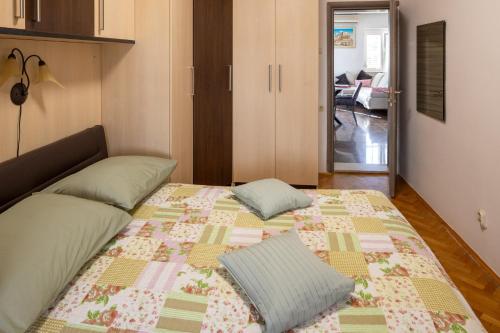 Ένα ή περισσότερα κρεβάτια σε δωμάτιο στο Apartment Metropolis Split