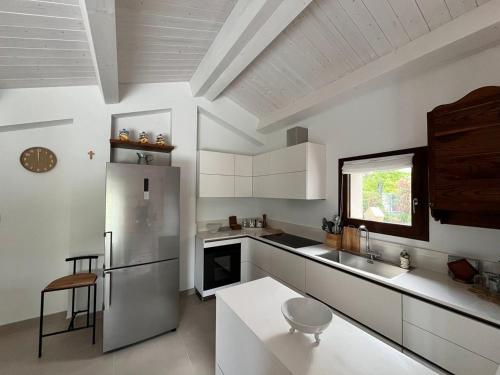 Η κουζίνα ή μικρή κουζίνα στο Poggio Ancisa Relais