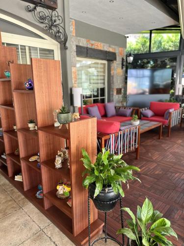 a room with wooden shelves with plants in it at Hotel Chateau de Ville in Marmaris