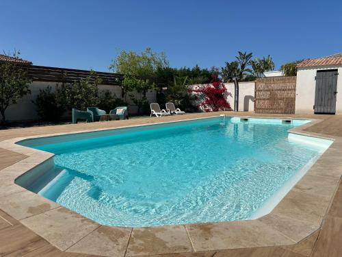Kolam renang di atau dekat dengan Très belle villa avec piscine chauffée CASALEONI