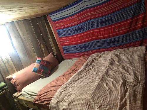 Postel nebo postele na pokoji v ubytování `Sin Chai Homestay
