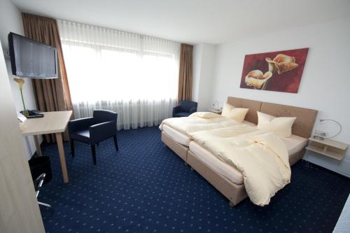 Ένα ή περισσότερα κρεβάτια σε δωμάτιο στο Hotel Restaurant Engel