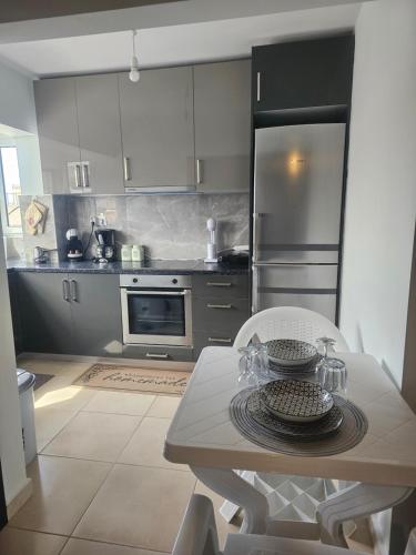 Η κουζίνα ή μικρή κουζίνα στο Monda Apartment