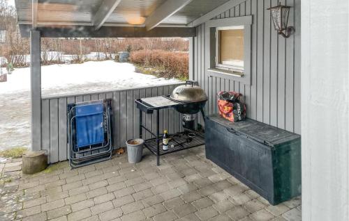 a grill on the side of a house at Beautiful Home In Örebro With Kitchen in Örebro