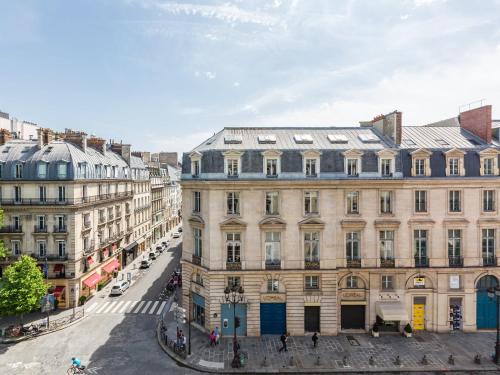 an aerial view of buildings in a city at Luxury 2 Bedroom - Louvre & Champs Elysees in Paris