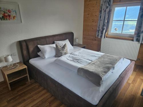 Ein Bett oder Betten in einem Zimmer der Unterkunft Nockhof