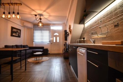 Passatempo Apartment Ireonにあるキッチンまたは簡易キッチン