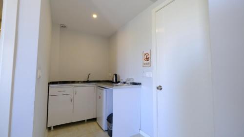 The Cotton Houseにあるキッチンまたは簡易キッチン