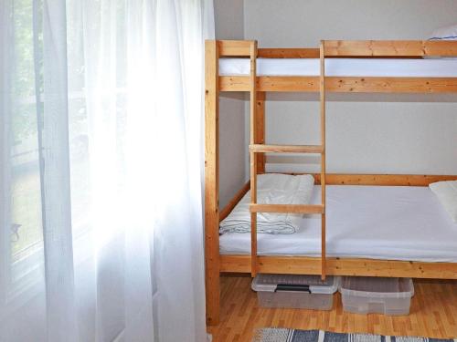 Dviaukštė lova arba lovos apgyvendinimo įstaigoje Holiday home LAHOLM XIV