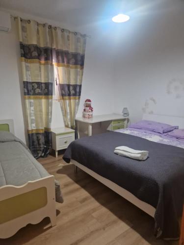 Postel nebo postele na pokoji v ubytování Gio' house