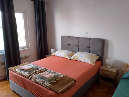 Llit o llits en una habitació de Apartments Silvija
