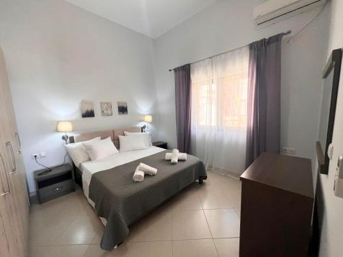 Llit o llits en una habitació de Villa Dea