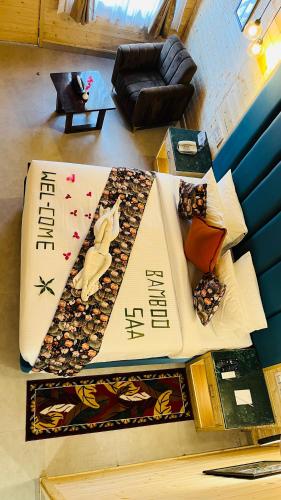 a large book sitting on top of a table at Bamboo Saa Mulberry Resort Pushkar in Pushkar