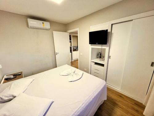 TV a/nebo společenská místnost v ubytování Flat no melhor local do Centro/Batel