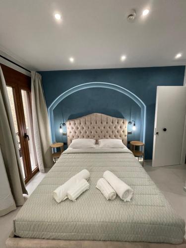 Postel nebo postele na pokoji v ubytování Incanto Luxury Suites
