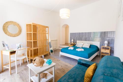 Postel nebo postele na pokoji v ubytování ACQUAMARINA