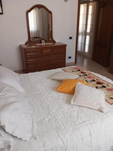 Ένα ή περισσότερα κρεβάτια σε δωμάτιο στο B&b Su Entu