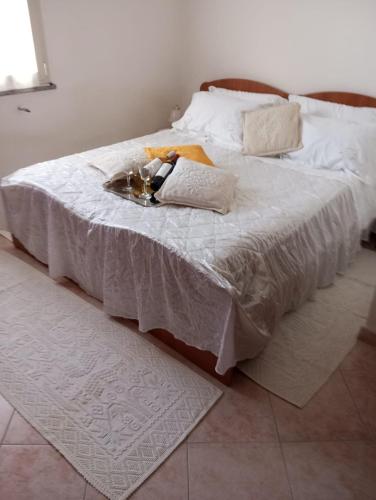 Ένα ή περισσότερα κρεβάτια σε δωμάτιο στο B&b Su Entu