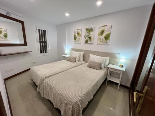 En eller flere senge i et værelse på Viña de mar cosy Apartment