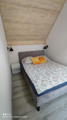 Ένα ή περισσότερα κρεβάτια σε δωμάτιο στο Nowy Domek z jacuzzi