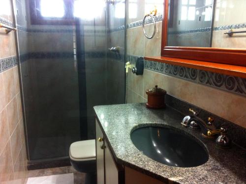 Kylpyhuone majoituspaikassa Village Pendotiba