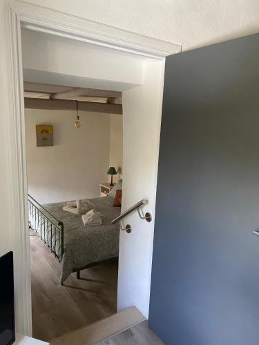 Ένα ή περισσότερα κρεβάτια σε δωμάτιο στο Casa Biscarello - Borgo e Lago