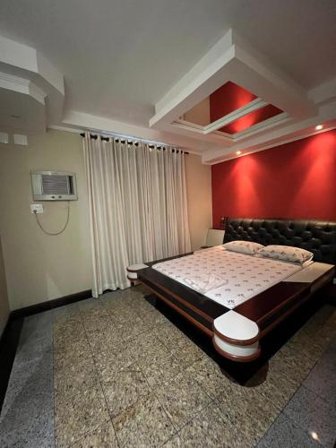Motel Vitoria Reggia tesisinde bir odada yatak veya yataklar