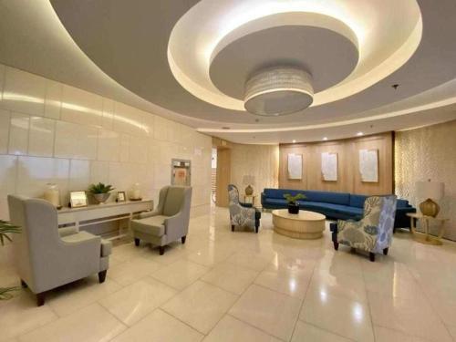 Lobbyn eller receptionsområdet på Shell Residences condotel Staycation