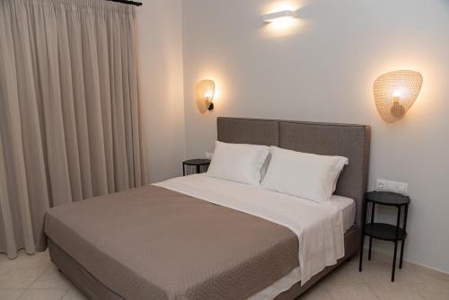 Ένα ή περισσότερα κρεβάτια σε δωμάτιο στο My Corfu Luxury Villa with private pool