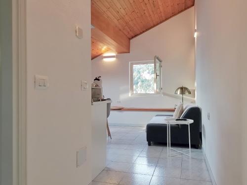 Postel nebo postele na pokoji v ubytování Mave's house 2, lake of Como, Bellano near Varenna