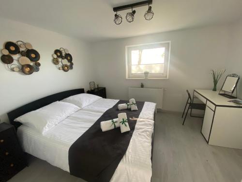 Katil atau katil-katil dalam bilik di Apartamenty Emerald Hills