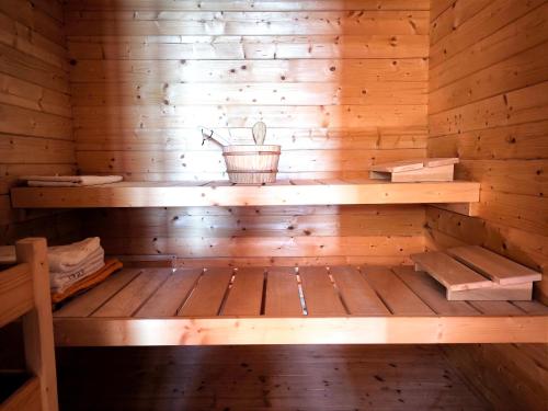 an inside of a sauna with a wooden wall at chata ,,Na Brehu'' in Klokočov