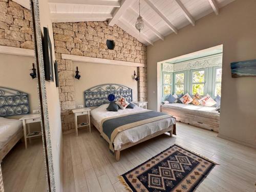 Katil atau katil-katil dalam bilik di Cassiopeia Otel Alaçatı