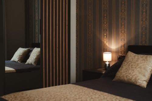 Una cama o camas en una habitación de Lifestyle and Suites