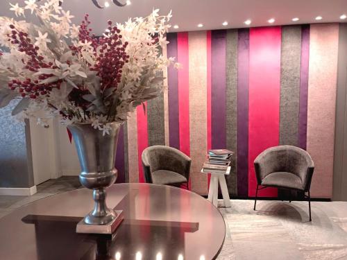 Zona de estar de Rioné Hotel Boutique