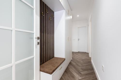 Postel nebo postele na pokoji v ubytování Dekaderon Lux Apartments