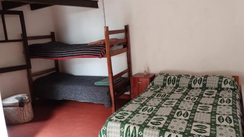 Dviaukštė lova arba lovos apgyvendinimo įstaigoje Sol de la cumbre