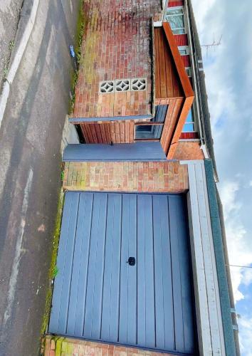 an overhead view of a garage with a blue door at Cancel in Yeovil